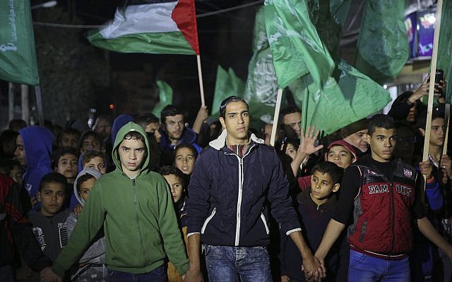 Hamas supporters wave their green flags during a protest against the possible US decision to recognize Jerusalem as Israel's capital, in Jebaliya Refugee Camp, Gaza Strip, Wednesday, Dec. 6, 2017. (AP Photo/Adel Hana) Hamas supporters wave their green flags during a protest against the possible US decision to recognize Jerusalem as Israel's capital, in Jebaliya Refugee Camp, Gaza Strip, Wednesday, Dec. 6, 2017. (AP Photo/Adel Hana)