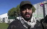 This frame grab from video provided on Dec. 8, 2017, by Asaid Ahl al-Haq's TV station al-Ahd, shows Iraqi militia commander Qais al-Khazali of the Iranian-backed Asaib Ahl al-Haq, or League of the Righteous, speaking in front of a wall that was built by Israel at the Fatima Gate border point in the southern village of Kfar Kila, Lebanon. (Al-Ahd TV station via AP)