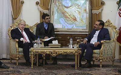 British Foreign Secretary Boris Johnson, left, and Secretary of Iran's Supreme National Security Council Ali Shamkhani, right, with interpreter at centre, during their meeting in Tehran, Iran, December 9, 2017. (AP/Vahid Salemi)