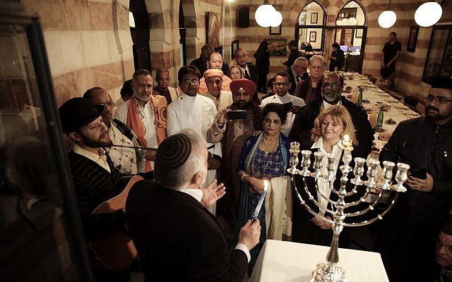Illustrative: An interfaith group from the Gulf state of Bahrain attends Hanukkah candle lighting in Jerusalem, December 12, 2017. (AP Photo/Mahmoud Illean) Illustrative: An interfaith group from the Gulf state of Bahrain attends Hanukkah candle lighting in Jerusalem, December 12, 2017. (AP Photo/Mahmoud Illean)