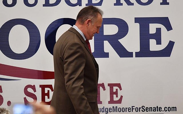 US Senate candidate Roy Moore leaves the stage after speaking at the RSA activity center, in Montgomery, Alabama, December 12, 2017. (Mike Stewart/AP) US Senate candidate Roy Moore leaves the stage after speaking at the RSA activity center, in Montgomery, Alabama, December 12, 2017. (Mike Stewart/AP)