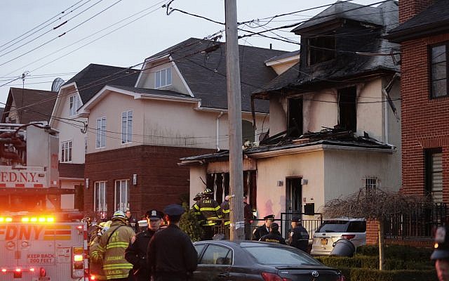 Police and firefighters converge on the scene of a fatal fire in the Sheepshead Bay neighborhood in the Brooklyn borough of New York, Dec. 18, 2017 (AP Photo/Mark Lennihan) Police and firefighters converge on the scene of a fatal fire in the Sheepshead Bay neighborhood in the Brooklyn borough of New York, Dec. 18, 2017 (AP Photo/Mark Lennihan)