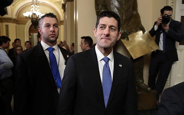 House Speaker Paul Ryan, a Wisconsin Republican, center, leaves the House Chamber after voting on the Republican tax bill, Tuesday, Dec. 19, 2017, on Capitol Hill in Washington. (AP Photo/Jacquelyn Martin) House Speaker Paul Ryan, a Wisconsin Republican, center, leaves the House Chamber after voting on the Republican tax bill, Tuesday, Dec. 19, 2017, on Capitol Hill in Washington. (AP Photo/Jacquelyn Martin)