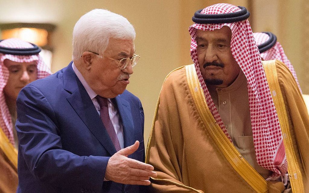 Saudi King Salman, right, receives Palestinian Authority President Mahmoud Abbas after he arrives in Riyadh, Saudi Arabia, December 20, 2017. (Al-Ekhbariya via AP)
