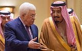 Saudi King Salman, right, receives Palestinian Authority President Mahmoud Abbas after he arrives in Riyadh, Saudi Arabia, December 20, 2017. (Al-Ekhbariya via AP)