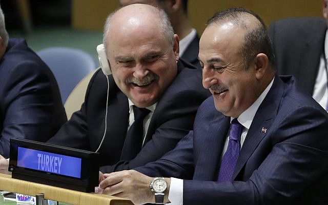 Mevlut Cavusoglu, right, Turkey's foreign minister, is seated with the country's delegation at the General Assembly, December 21, 2017, at United Nations headquarters. (AP/Mark Lennihan) Mevlut Cavusoglu, right, Turkey's foreign minister, is seated with the country's delegation at the General Assembly, December 21, 2017, at United Nations headquarters. (AP/Mark Lennihan)
