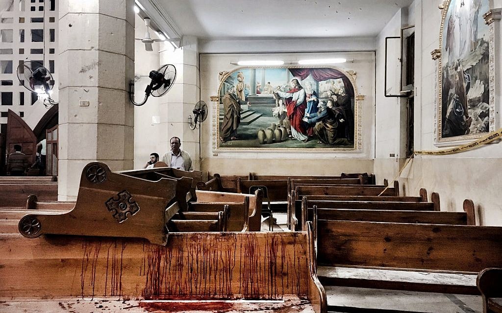 Blood stains pews inside the St. George Church after a suicide bombing, in the Nile Delta town of Tanta, Egypt, April 9, 2017. (AP Photo/Nariman El-Mofty)