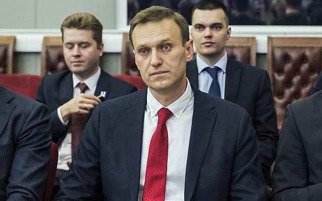 Russian opposition leader Alexei Navalny, sits at the Russia's Central Election commission in Moscow, Russia, Monday, Dec. 25, 2017. (Evgeny Feldman/Navalny Campaign via AP) Russian opposition leader Alexei Navalny, sits at the Russia's Central Election commission in Moscow, Russia, Monday, Dec. 25, 2017. (Evgeny Feldman/Navalny Campaign via AP)