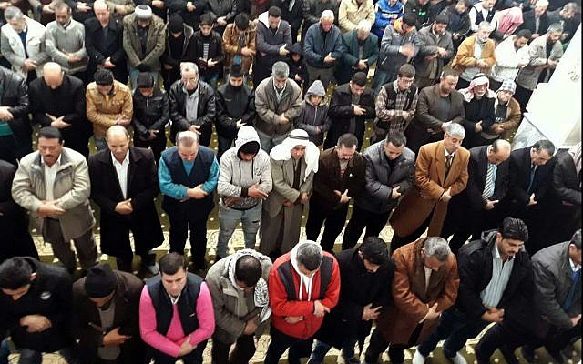 In this photo released by the Syrian official news agency SANA, Syrian citizens pray for rain during the Friday prayer, in Hasakeh, Syria, on December 29, 2017. (SANA via AP) In this photo released by the Syrian official news agency SANA, Syrian citizens pray for rain during the Friday prayer, in Hasakeh, Syria, on December 29, 2017. (SANA via AP)