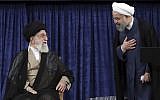 Iranian Supreme Leader Ayatollah Ali Khamenei, left, and President Hassan Rouhani greet at the official endorsement ceremony of President Rouhani in Tehran, Iran, August. 3, 2017. (Office of the Iranian Supreme Leader via AP)