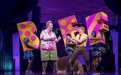 Danny Skinner, left, as Patrick Star and Ethan Slater as SpongeBob SquarePants perform in 'SpongeBob SquarePants: The Broadway Musical.' (Joan Marcus/via JTA)