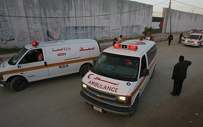 Illustrative: Palestinian ambulances in Gaza waiting at the Rafah border crossing on January 10, 2008. (Abed Rahim Khatib/Flash
90/File)