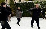 Prime Minister Benjamin Netanyahu has a snowball fight with his wife, Sara, and sons Avner and Yair at his residence in Jerusalem on January 10, 2013 (Avi Ohayon/GPO/FLASH90)
