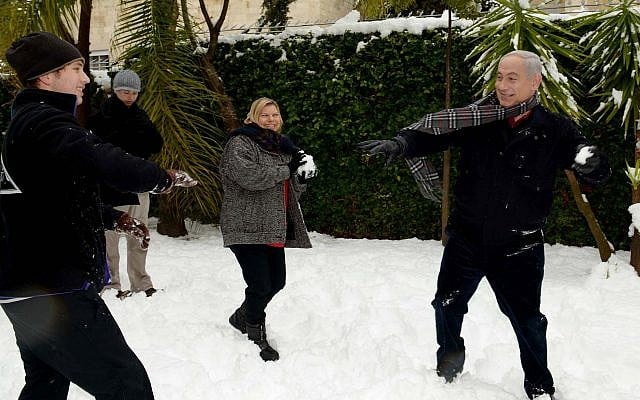 Prime Minister Benjamin Netanyahu has a snowball fight with his wife, Sara, and sons Avner and Yair at his residence in Jerusalem on January 10, 2013 (Avi Ohayon/GPO/FLASH90) Prime Minister Benjamin Netanyahu has a snowball fight with his wife, Sara, and sons Avner and Yair at his residence in Jerusalem on January 10, 2013 (Avi Ohayon/GPO/FLASH90)