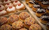 Doughnuts (sufganiyot) on sale at Marzipan bakery in Jerusalem, for the upcoming Jewish holiday of Hanukkah. December 16, 2014. (Hadas Parush/FLASH90)