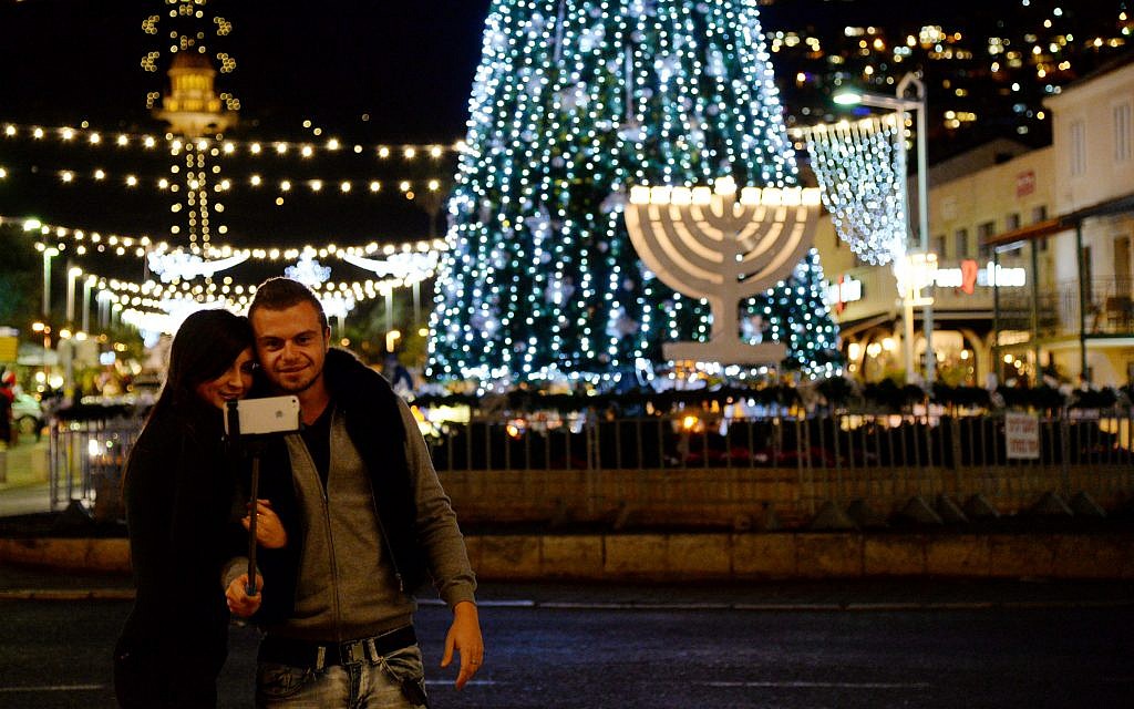 Celebrating the Holiday of Holidays, the cross-section of Hanukkah, Christmas and Id al-Adha in Haifa (Sapir Bronzberg/Flash 90) Celebrating the Holiday of Holidays, the cross-section of Hanukkah, Christmas and Id al-Adha in Haifa (Sapir Bronzberg/Flash 90)