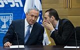 Prime Minister Benjamin Netanyahu (left) with MK Miki Zohar during a Likud faction meeting at the Knesset, on December 7, 2015. (Yonatan Sindel/Flash90)