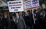 Illustrative: Ultra-Orthodox Jew, belonging to the anti-Zionist Neturei Karta group protest against the State of Israel in Jerusalem's Mea Shearim neighborhood on August 4, 2016. (Yonatan Sindel/Flash90)