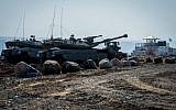 Israeli soldiers patrol the Israeli-Syrian border in the Golan Heights, file (Basel Awidat/ Flash90)