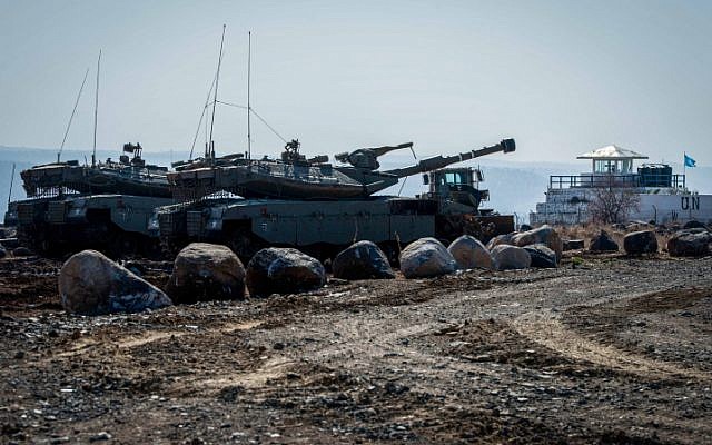 Israeli soldiers patrol the Israeli-Syrian border in the Golan Heights, file (Basel Awidat/ Flash90) Israeli soldiers patrol the Israeli-Syrian border in the Golan Heights, file (Basel Awidat/ Flash90)