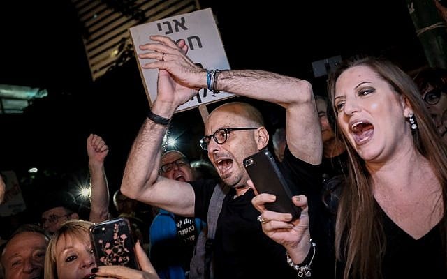 Protesters take part in the anti-corruption 'march of shame' in Tel Aviv on December 2, 2017. (Tomer Neuberg/Flash90) Protesters take part in the anti-corruption 'march of shame' in Tel Aviv on December 2, 2017. (Tomer Neuberg/Flash90)