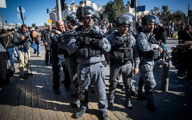 Israeli Police officers stand guard during a protest at Damascus Gate in the Old City of Jerusalem on December 8, 2017. (Yonatan Sindel/Flash90)