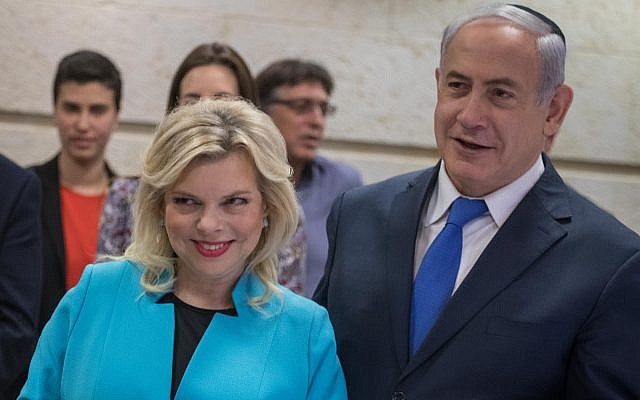 Prime Minister Benjamin Netanyahu, his wife Sara, take part in a menorah lighting ceremony on the first candle night of the Jewish holiday of Hanukkah, at the Foreign Ministry in Jerusalem, on December 12, 2017. (Hadas Parush/Flash90) Prime Minister Benjamin Netanyahu, his wife Sara, take part in a menorah lighting ceremony on the first candle night of the Jewish holiday of Hanukkah, at the Foreign Ministry in Jerusalem, on December 12, 2017. (Hadas Parush/Flash90)