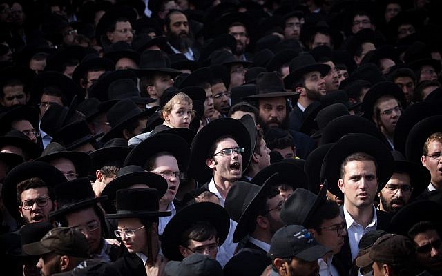 Thousands of followers of Rabbi Aharon Leib Steinman attend his funeral in the Bnei Brak, on December 12, 2017. Rabbi Aharon Leib Shteinman passed away earlier this morning at the age of 104. (Yonatan Sindel/Flash90) Thousands of followers of Rabbi Aharon Leib Steinman attend his funeral in the Bnei Brak, on December 12, 2017. Rabbi Aharon Leib Shteinman passed away earlier this morning at the age of 104. (Yonatan Sindel/Flash90)