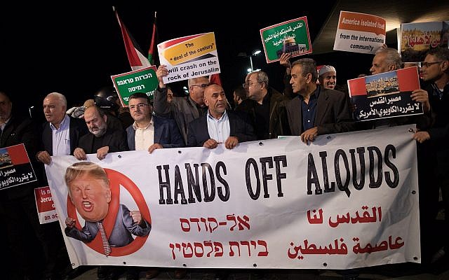 Arab Israelis take part in a protest outside the American embassy in Tel Aviv against US President Donald Trump's decision to recognize Jerusalem as Israel's capital on December 12, 2017. (Yonatan Sindel/Flash90)