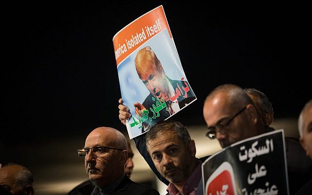 Arab Israelis take part in a protest outside the American embassy in Tel Aviv against US President Donald Trump's decision to recognize Jerusalem as Israel's capital on December 12, 2017. (Yonatan Sindel/Flash90)