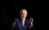 Prime Minister Benjamin Netanyahu speaks at a Likud rally marking the Hanukkah holiday in Tel Aviv on December 19, 2017. (Flash90)