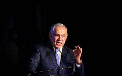 Prime Minister Benjamin Netanyahu speaks at a Likud rally marking the Hanukkah holiday in Tel Aviv on December 19, 2017. (Flash90)