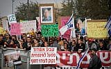Teva employees and their families demonstrate outside the Prime Minister's Office in Jerusalem over the company's plan to lay off some 1,700 employees, on December 19, 2017. (Hadas Parush/Flash90)