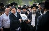 Thousands mourn at the funeral of four members of the Azan family killed in a Booklyn  housefire, Aliza Azan, 39, and three of her children Moshe, 11, Yitzchak, 7, and three-year-old Henrietta, in Holon on December 20, 2017. (FLASH90)