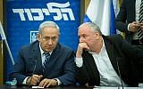 Prime Minister Benjamin Netanyahu (left) and coalition chairman David Amsalem converse during a Likud faction meeting at the Knesset on December 25, 2017. (Miriam Alster/Flash90)