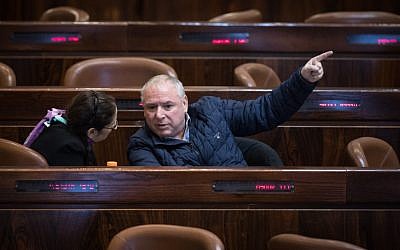 Coalition chairman David Amsalem seen during a marathon plenary session in the Knesset regarding the police recommendations bill, December 27, 2017 (Hadas Parush/Flash90)