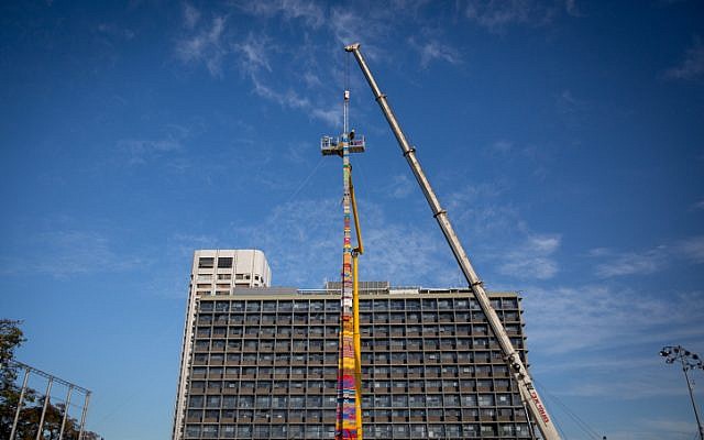 View of construction of a 36-meter high lego tower, intending to break the Guinness World Record. December 27, 2017. (Miriam Alster/FLASH90)
