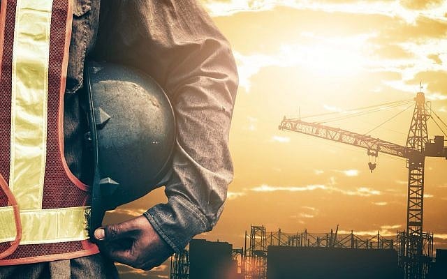 Illustrative image of a builder at a construction site (shih-wei, iStock by Getty Images)