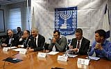 Finance Minister Moshe Kahlon (third from left) announces a reduction in customs and purchase tax rates for consumers at a press conference in Jerusalem; December 11, 2017 (Finance Ministry spokesperson's office)