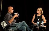 Avi Issacharoff (left), the creator of 'Fauda,' speaks with Sarah Tuttle-Singer at a Times of Israel event on December 3, 2017 in Jerusalem (Beit Avi Chai)