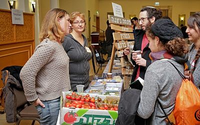 New immigrants at a conference in Jerusalem on affordable communities in Israel, November 2017. (Yonit Schiller via JTA)