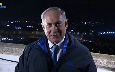 Prime Minister Benjamin Netanyahu wishes 'Merry Christmas' on December 24, 2017. (Screen capture: Facebook video)