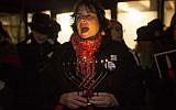 Rabbi Debra Cantor of Congregation B’nai Tikvoh-Sholom in Bloomfield, Connecticut, speaking at Trump Tower in Manhattan at the 'Not The White House Chanukah Party,' a protest organized by T’ruah, December 13, 2017. (JTA/Jake Ratner)