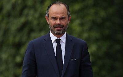French Prime Minister Edouard Philippe preparing to review a guard of honor upon Philippe’s arrival at the German Chancellery in Berlin, Germany, September 15, 2017. (Sean Gallup/Getty Images)