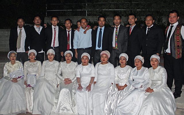 Nine Bnei Menashe couples married on December 20 at Shavei Israel’s absorption center in Kfar Hasidim (Shlomo Haokip/Shavei Israel) Nine Bnei Menashe couples married on December 20 at Shavei Israel’s absorption center in Kfar Hasidim (Shlomo Haokip/Shavei Israel)