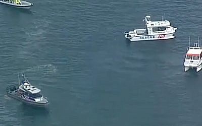 Screen capture from video of recovery efforts after six people died when a sea plane crashed into the Hawkesbury River, north of Sydney, Australia, December 31, 2017. (YouTube)