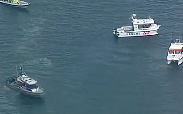 Screen capture from video of recovery efforts after six people died when a sea plane crashed into the Hawkesbury River, north of Sydney, Australia, December 31, 2017. (YouTube) Screen capture from video of recovery efforts after six people died when a sea plane crashed into the Hawkesbury River, north of Sydney, Australia, December 31, 2017. (YouTube)