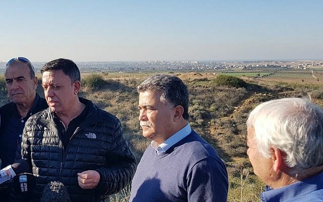 Zionist Union leader Avi Gabbay (2nd L) and former defense minister Amir Peretz (2nd R) tour the Gaza border region on December 26, 2017 (Courtesy/Zionist Union)