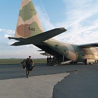 An Israeli soldiers exits a C-130 transport plane in Cyprus as part of a binational exercise in early December 2017. (Israel Defense Forces)