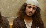 Yinon Reuveni, suspected of vandalizing the church of the Multiplication of the Loaves and Fishes in Tabgha, on the shore of the Sea of Galilee, is seen at the Nazareth Magistrate's Court on July 29, 2015. (Photo by Basel Awidat/Flash90)
